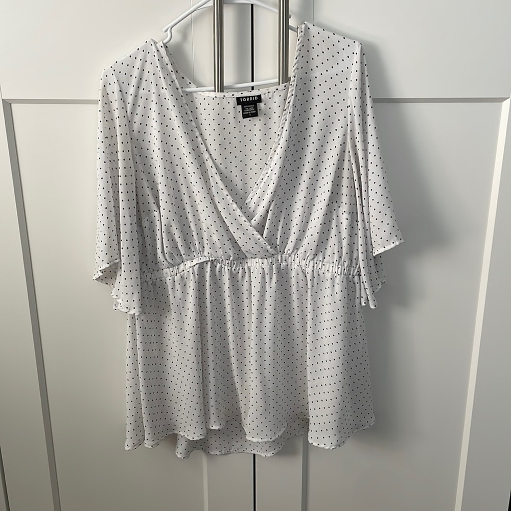 White torrid top with black polka dots, size 1
